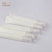 Emballage personnalisé de tubes en plastique blanc vides de 3 ml et 5 ml, tubes à presser pour crème pour les yeux, huile à lèvres, gloss, avec applicateur en métal et en céramique