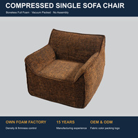 Fauteuil simple compressé sans structure, entièrement en mousse, avec accoudoirs larges, emballé sous vide, sans cadre, pour salon