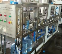 Machine de remplissage d'eau pure électrique automatique 500 ml, haute productivité, moteur à économie d'énergie, PLC pour boissons, Dubaï