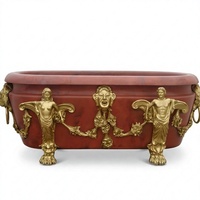 Baignoire autoportante rectangulaire en marbre rouge-brun avec pieds en griffes de lion et masque de lion doré pour villa et hôtel