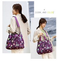 Sac à bandoulière de voyage KINGYE KY-HB187, fourre-tout à fleurs, fermeture éclair, nylon imperméable, 35x30x13CM, sac à main tendance pour femme avec pompon