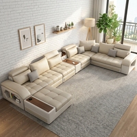 Ensemble de canapés modulaires en cuir beige avec porte-gobelets intelligents et appuie-têtes réglables pour salon