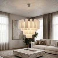 Lustre LED personnalisé en verre et métal, design nuage, style moderne minimaliste et luxe léger, pour salon, chambre et salle à manger de villa ou hôtel.