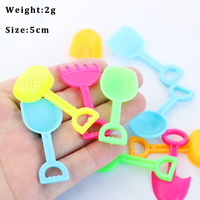 Prix abordable : Mini-pelles en plastique, jouet de plage, pelles de couleur unie, mini-pelles pour jardin, jouet de scène de plantation extérieure, modèle de jouet