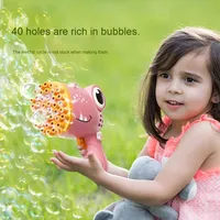 Vente chaude 40 trous dinosaure bulle Gatling jouet nouveauté transfrontalière en plastique bulle soufflant Machine pour enfants rue décrochage