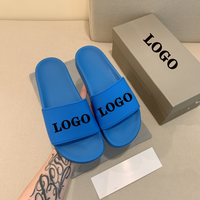 Diapositives de luxe pantoufles unisexe chaussures en gros dames pantoufles haute qualité femmes sandales 2025 nouveau Style hommes marque pantoufles