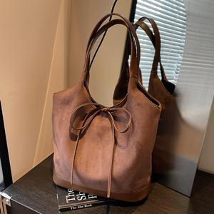 กระเป๋าถือทรงบัคเก็ตขนาดใหญ่ ดีไซน์สะพายไหล่เดียว รุ่น 2025  ตกแต่งโบว์แบบนิช  วัสดุฟรอสต์  สำหรับผู้หญิง - Product Image 5