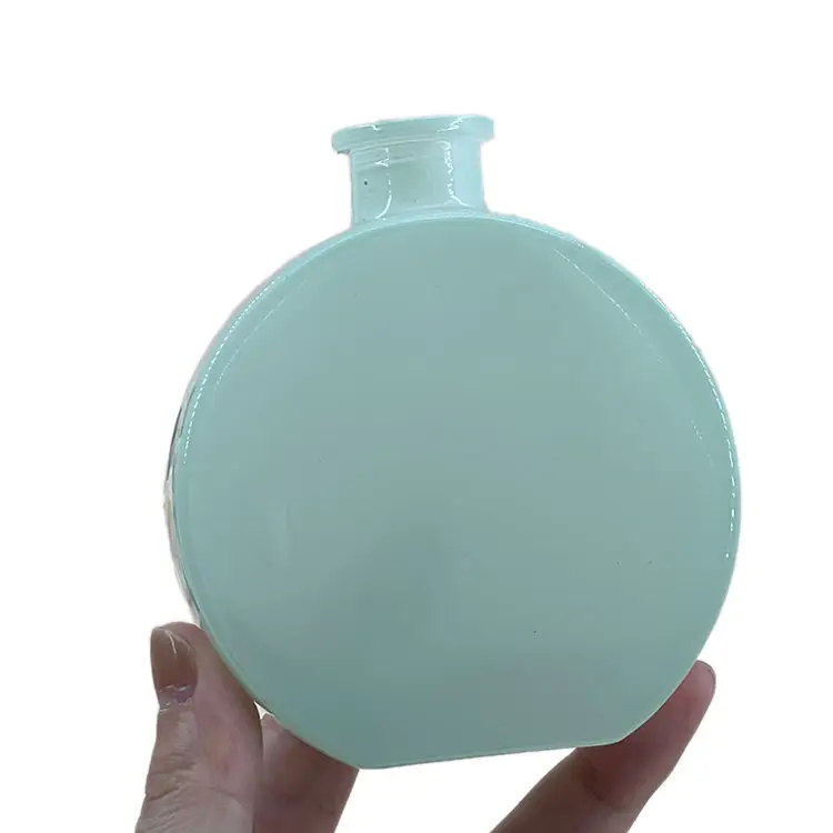 حار بيع فارغة 100 مللي دائرة شكل الأخضر الهواء تعيش رائحة ناشر الريش الزجاجي زجاجة مع الألومنيوم الفلين