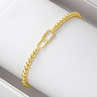 Bijoux OEM : Bracelet à double anneau géométrique en cuivre plaqué or 18 carats avec fermoir à anneaux, perles rondes et incrustation de zircon, tendance