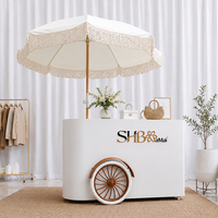 Carrito Móvil Plegable Elegante con Puertas para Guardar Sombrillas, Ideal para Bodas, Eventos de Comida, Exhibiciones de Dulces, Cafeterías y Venta Minorista