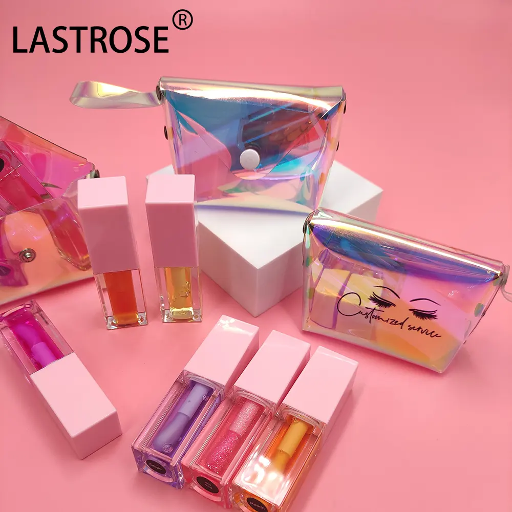Wholesale low MOQ high quality lip gloss 30 color flavouring oil private label clear vegan pink plumped lip oil