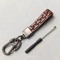 Porte-clés rond en cuir tressé avec anneau en D métallique, support portable pour clés de voiture et moto, accessoires de mode quotidiens