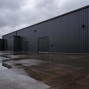 โรงงานผลิตโครงสร้างเหล็กสำเร็จรูปสำหรับร้านซ่อมรถยนต์ SUNRISE Steel Structure Workshop - Product Image 1