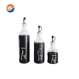 Botella de Vidrio para Aceite de Oliva con Recubrimiento de Acero Inoxidable, en Oferta - Product Image 1