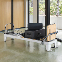 Réformateur de Pilates en aluminium blanc professionnel durable personnalisé lisse et silencieux à vendre