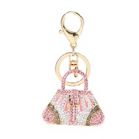 Boutons de manchette créatifs en alliage, entièrement sertis de diamants, en forme de mini-sac, sportifs, toutes saisons, de luxe léger, fabriqués avec soin, et pendentif de sac à main ou de voiture
