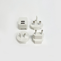 Mendukung kustomisasi adaptor universal dual port 5V 2.1A transformer dengan 4pcs diganti plug universal charger kompak