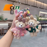 Porte-clés en peluche ours mignon rose avec écharpe et nœud, style dessin animé créatif, pendentif pour sac à dos, accessoire de mode, porte-clés au crochet
