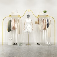 Vêtements muraux créatifs de luxe pour femmes, présentoirs en métal