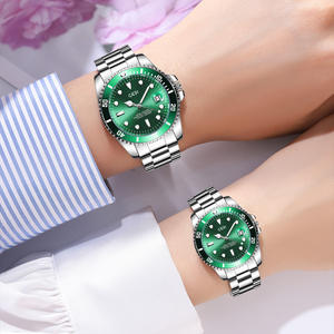 Montre pour femme et homme avec bracelet en acier, montre à quartz à date luminescente verte de haute valeur - Product Image 1