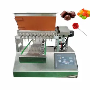 Fabrika kaynağı güzel fiyatlı Lab sert yumuşak jöle lolipop sakızlı şeker Depositor dökme makinesi satılık