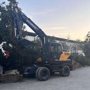 Hyundai150W-9T d'occasion NICE PRICE EN VENTE Hyundai 150W-7 R150W-7 150w-9 Excavateur sur pneus de 15 tonnes Machine de construction d'occasion en vente - Product Image 4