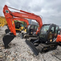 Mini-excavatrice Hitachi ZX70 d'occasion, poids opérationnel de 7 tonnes, sur chenilles, avec moteur et pompe, composants essentiels, à vendre