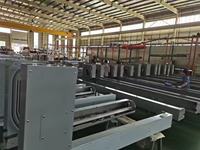 Portes d'entrepôt isolées résistantes aux ouragans pour le projet du parc logistique HX, porte spirale à grande vitesse, porte à enroulement industrielle