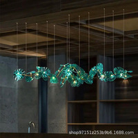 Lustre LED personnalisé en verre pour hôtel, villa, escalier, salon, salle à manger, design créatif long et ajouré, motif feuille de lotus verte
