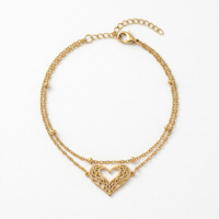 QIAOREN 11944 Bracelet tendance en filigrane en forme de cœur superposé, en acier inoxydable plaqué or 18 carats, avec chaîne satellite et motif cœur ajouré, bijoux