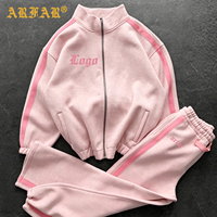 Fabricants de vêtements pour femmes : Ensemble décontracté 2 pièces (veste à rayures latérales et pantalon de jogging) avec logo personnalisé – Collection 2026
