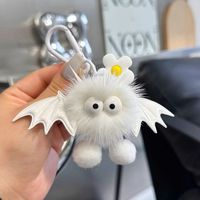 Porte-clés fantaisie en fourrure de vison avec ailes de chauve-souris et pompon moelleux, breloque de sac de luxe, accessoires de mode pour filles - Vente en gros