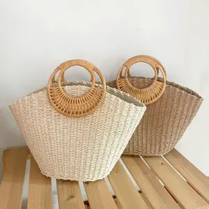 The new rattan handles the fashionable female bag woven straw fashion recycled leisure bag beach holiday bag