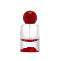 Flacon en verre luxueux vide de 30 ml, 50 ml, 100 ml, avec base en forme de montagne unique et bouchon rond rouge et doré pour l'emballage de parfums