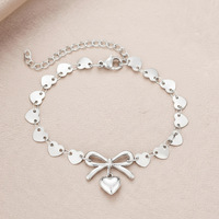 Bracelet en acier inoxydable imperméable avec nœud papillon, bracelet créatif en forme de cœur, bijoux anti-décoloration pour femmes