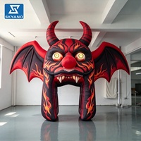 Arche gonflable personnalisée en forme de tête de démon pour Halloween, idéale pour la décoration publicitaire d'événements en extérieur et de zones scéniques
