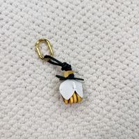 2025 nouveau cuir en peau de mouton couleur gland fleur sac petits ornements mode délicat voiture porte-clés pendentif