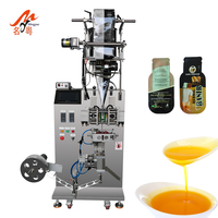 Automatische 10ml honingzakjes verpakkingsmachine, onregelmatige zakjes vulling en verpakkingsmachine voor gelei, siroop en vruchtensap met datumprinter