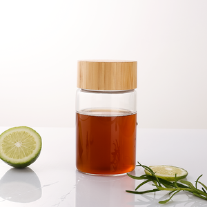 Großhandel Luxus Runde Borosilikatglas-Wasserflasche mit Individuellem Deckel 2oz~25oz, Glas-Saftflasche mit Mehreren Kapazitäten und Holzdeckel - Product Image 6