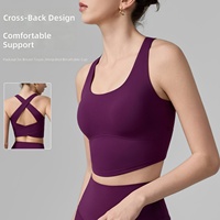 Débardeur de yoga ajouré pour femme avec coussinets fixes, design push-up et absorbant les chocs, bretelles croisées