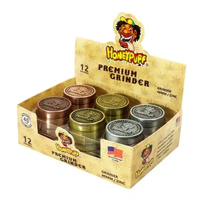 Venta al por mayor 40mm * 25mm molinillo tabaco hierba 3 capas Aleación de Zinc molinillo de hierbas para fumar venta al por mayor molinillo de hierbas 12 uds/caja de presentación