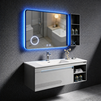 Armoire de salle de bain à miroir LED en verre trempé avec éclairage d'ambiance, design géométrique, rangement ouvert, durable et résistant à l'humidité