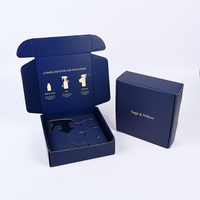 Emballage de bouteille de parfum de soins de la peau bleu marine de 50ml avec logo personnalisé bon marché boîte en carton ondulé de fabrication chinoise