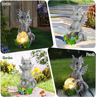 Statues d'extérieur de jardin solaire Dragon tenant un orbe magique avec des lumières solaires à LED