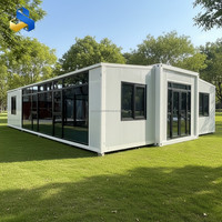 Villa préfabriquée de luxe extensible 20ft 40ft, maison conteneur 3 chambres, design moderne respirant, panneaux sandwich acier-bois, extérieur