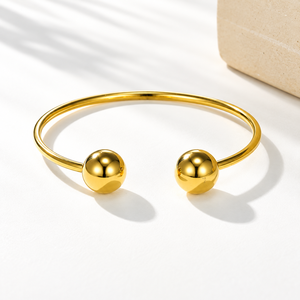 กำไลข้อมือแบบเปิดทรงกลมคู่ สแตนเลสสตีลชุบทอง 18K ด้วยวิธีเคลือบสูญญากาศ ขัดเงาสีทอง - Product Image 1