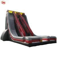 Toboggan gonflable commercial à double voie avec barrière de sécurité intégrale pour la location d'équipements de divertissement de carnaval en extérieur