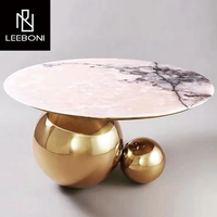 Table basse ronde de luxe en marbre de style italien table basse à pieds boule en acier inoxydable pour salon