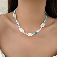 Collier tendance en laiton tressé avec pendentif étoile de mer, tortue marine, coquillage et perle, chaînes de perles de riz colorées pour femmes UIONEN 1370