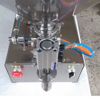 Machine de remplissage pneumatique semi-automatique à tête unique pour liquides et pâtes, idéale pour la production de crèmes, miels, sauces et cosmétiques